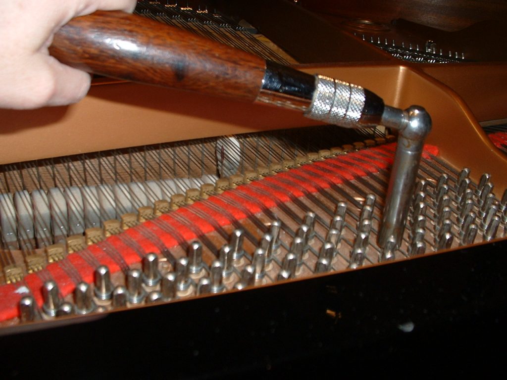 Piano tuning lever on a tuning pin in a piano